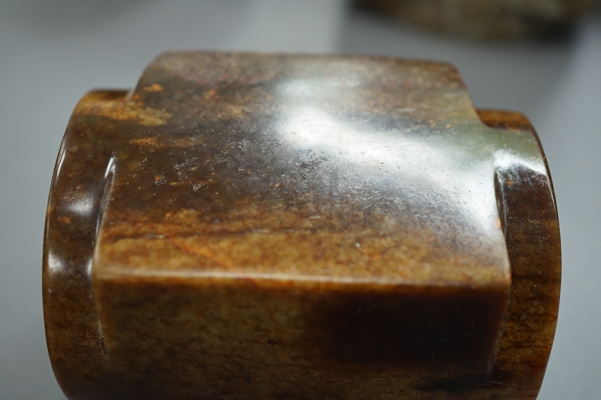 Four Chinese archaistic jade or hardstone cong